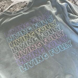 Living fully co- rainbow sweatshirt. Size medium.